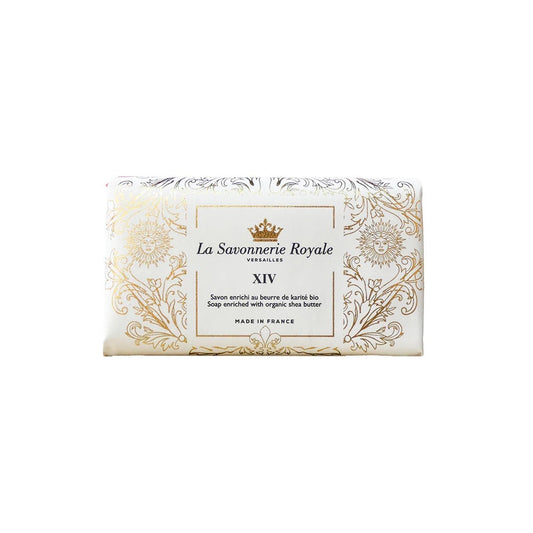 Eclectic La Savonnerie Royale XIV soap bar in ornate white and gold packaging with Sun King and Fleur-de-lys motifs.