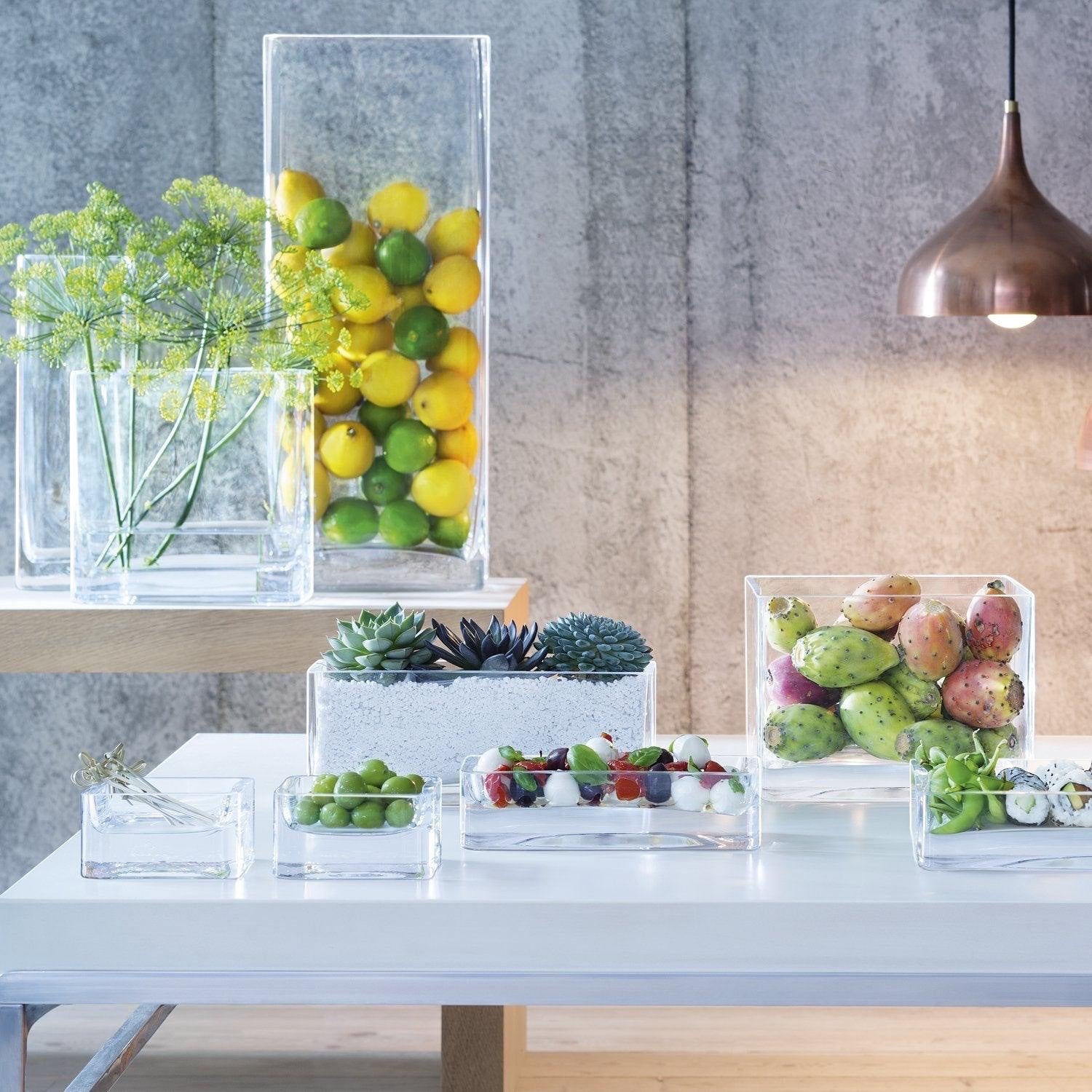 Eclectic LSA International modular clear glass rectangular centrepiece tray holding fresh food on a white table