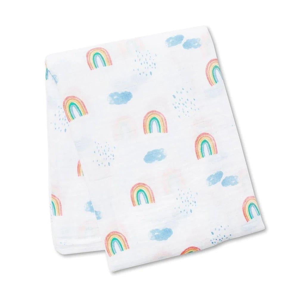 Eclectic Lulujo white cotton muslin swaddle featuring a colourful rainbow and sky print for newborns