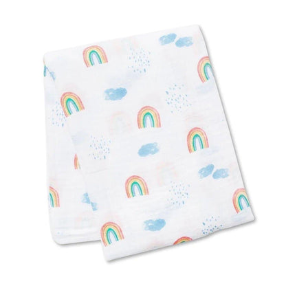 Eclectic Lulujo white cotton muslin swaddle featuring a colourful rainbow and sky print for newborns