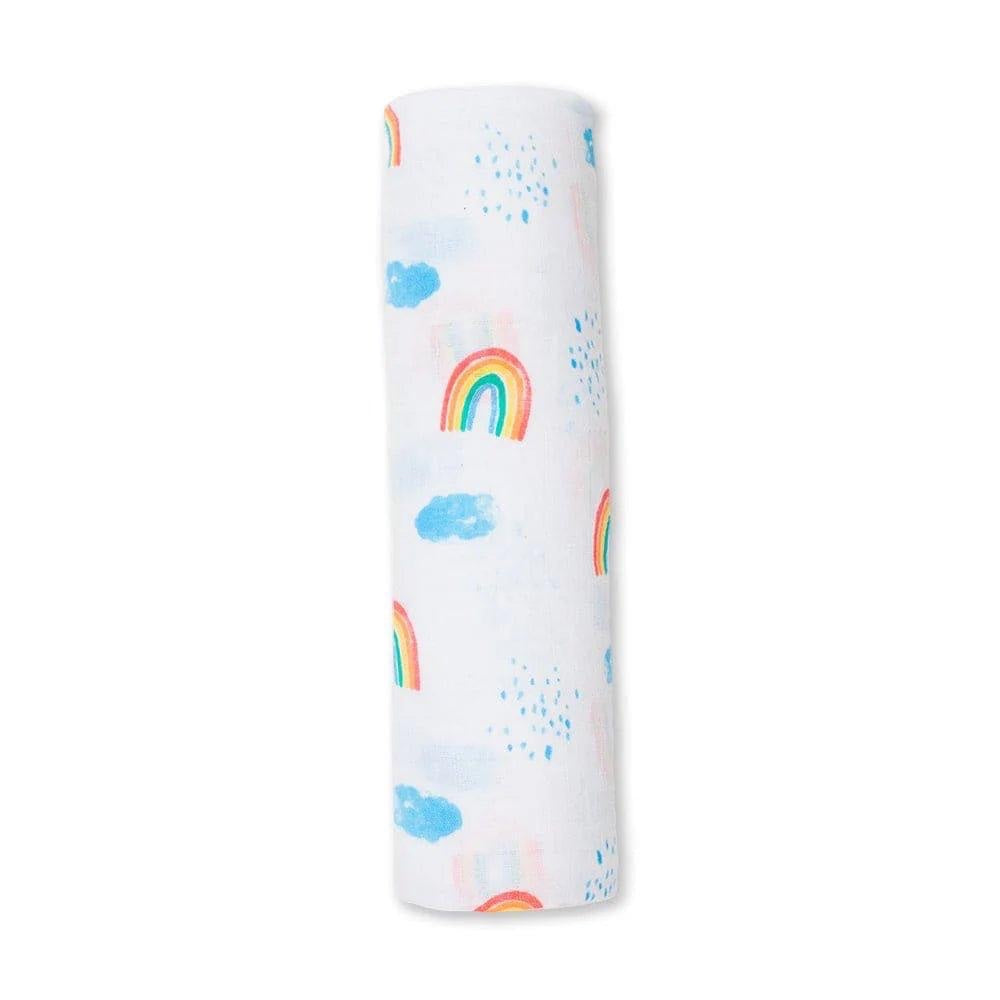 Eclectic Lulujo cotton muslin swaddle featuring a white background with a colourful rainbow and sky print.