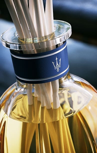 Eclectic Dr Vranjes Maserati diffuser refill bottle with white reeds and blue branded neck label