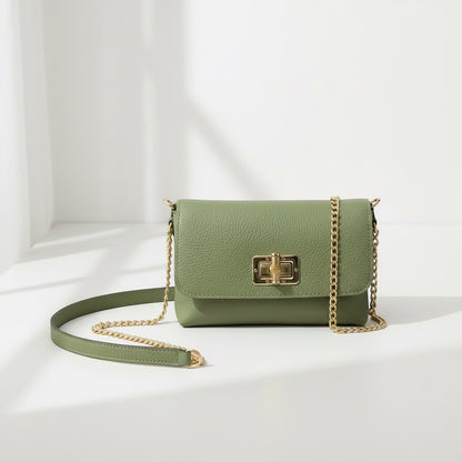 Eclectic olive pebbled leather clutch with gold chain strap and bamboo-inspired clasp, made in Italy.