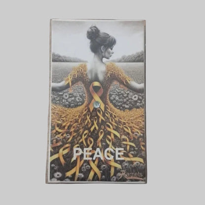 Eclectic decorative matchbox featuring a woman in a yellow ribbon dress with the word PEACE in a field
