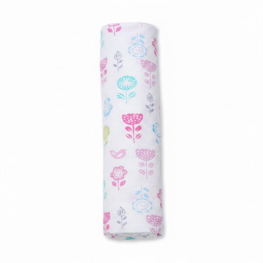 Eclectic Petal Garden cotton flannel swaddle featuring a white background with a pastel floral print.