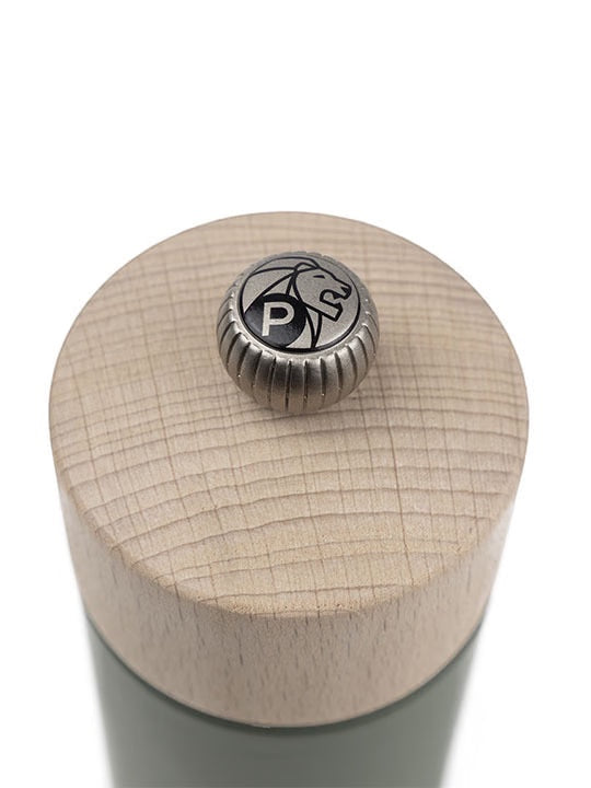 Eclectic Peugeot Boreal pepper mill top view showing the natural beechwood finish and metal adjustment knob