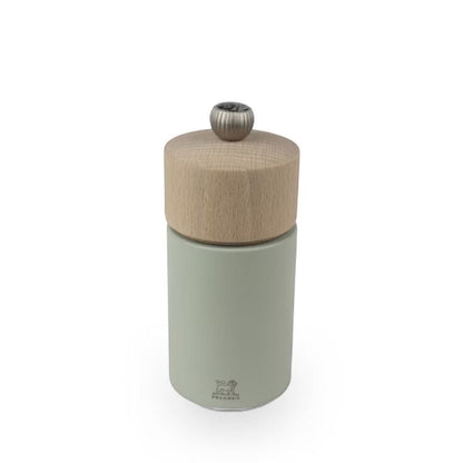 Eclectic Peugeot Boreal 12cm salt mill in sage green beechwood with a natural wood top and adjustable metal knob.