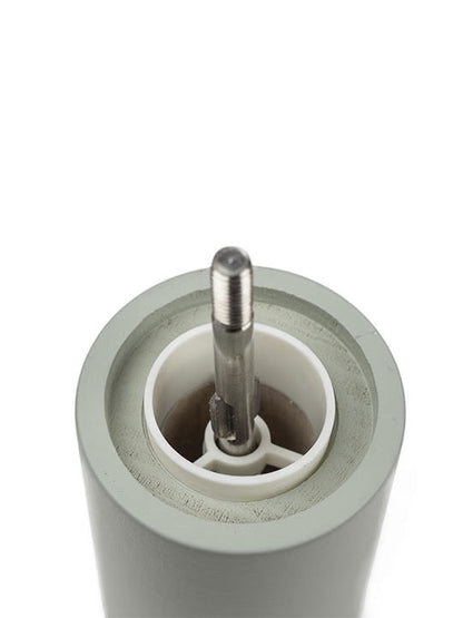 Eclectic Peugeot Boreal salt mill in sage green beechwood showing the internal Zirlion grinding mechanism top view