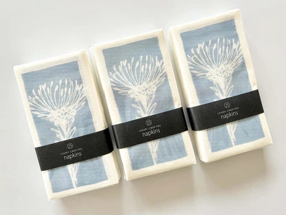 Eclectic Pincushion blue disposable airlaid napkins with a linen-feel texture and botanical floral print in a pack of 25