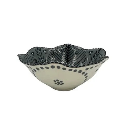 Eclectic Potterseed ceramic sweetie bowl with hand-painted black poppy motif on a cream glazed scalloped edge dish.