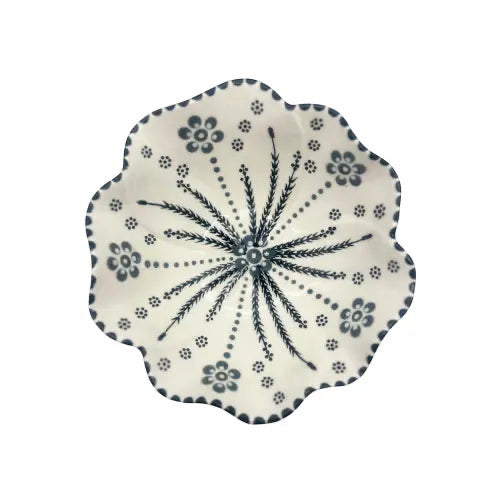 Eclectic Potterseed Poppy ceramic pasta bowl with a scalloped edge and blue floral pattern on a white background