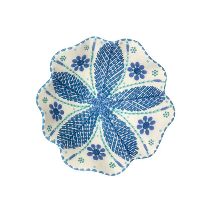 Eclectic Potterseed Poppy ceramic pasta bowl with blue floral and leaf pattern on a white scalloped edge background