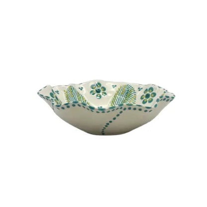 Eclectic Potterseed Poppy ceramic pasta bowl with a scalloped edge and hand-painted green and blue floral pattern.