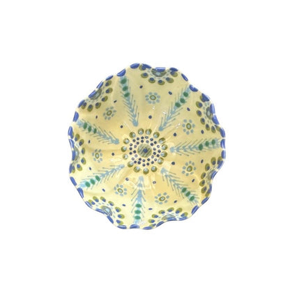 Eclectic Potterseed poppy-inspired ceramic ramekin with frilled edges and hand-painted blue and green floral patterns.