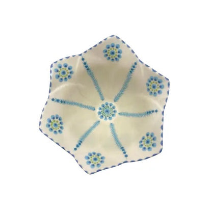 Eclectic Potterseed Tulip bowl in white ceramic with blue and green floral hand-painted details, top view.