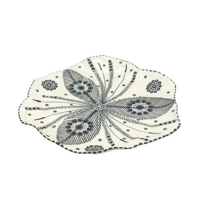 Eclectic Potterseed Tulip dinner plate featuring a hand-painted black botanical pattern on white ceramic.