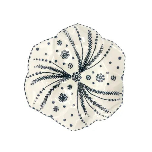 Eclectic Potterseed Tulip side plate in white ceramic with hand-painted blue botanical patterns and scalloped edges.