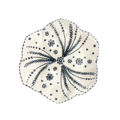 Eclectic Potterseed Tulip side plate in white ceramic with hand-painted blue botanical patterns and scalloped edges.
