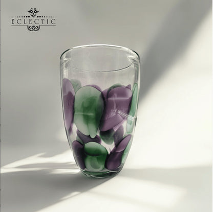 Eclectic purple and green petal glass vase with a smooth polished finish and sculptural organic design.