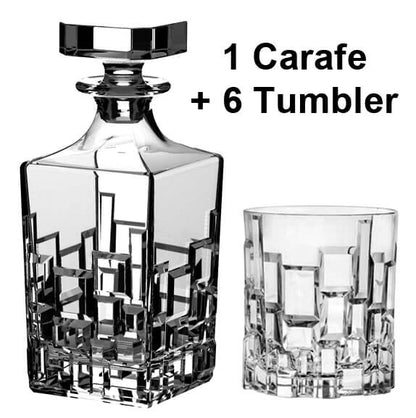 Eclectic RCR Etna 7-piece crystal whisky decanter and tumbler set with geometric cut patterns in clear glass