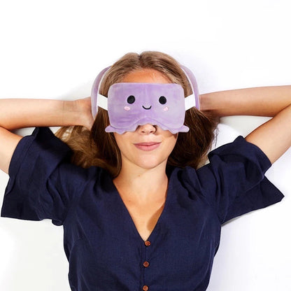 Eclectic Relaxeazzz Wendy the Octopus purple plush eye mask worn by a woman for travel comfort
