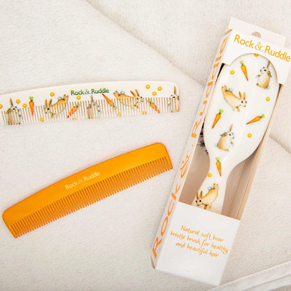 Eclectic Rock & Ruddle baby hairbrush and two combs featuring charming rabbit and carrot illustrations on a white background