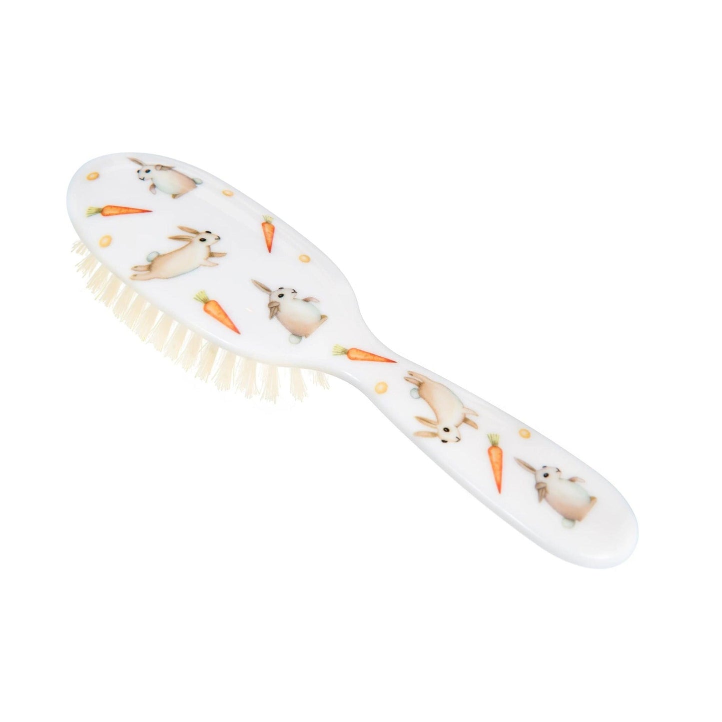 Eclectic Rock & Ruddle baby hairbrush featuring a white handle with a charming rabbit and carrot illustration.