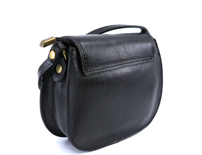 Eclectic Rosa black Italian leather crossbody bag with brushed brass hardware and adjustable strap, side view.