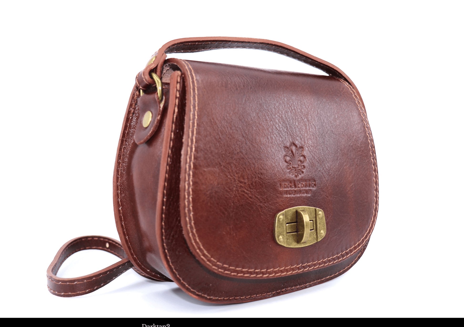 Eclectic Rosa dark tan Italian leather crossbody bag with brushed brass twist-lock hardware and adjustable strap.