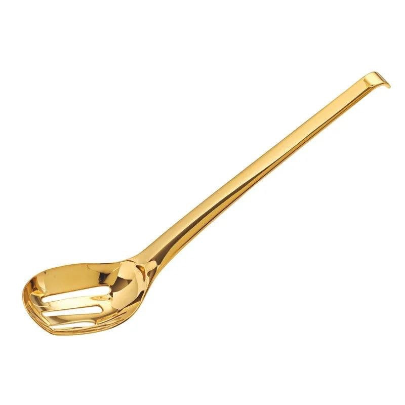Eclectic Sambonet Living gold PVD stainless steel ice spoon with a perforated bowl for draining meltwater.