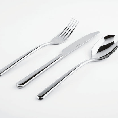 Eclectic Sambonet Linear cutlery set featuring a mirror-polished stainless steel fork, knife, and spoon.