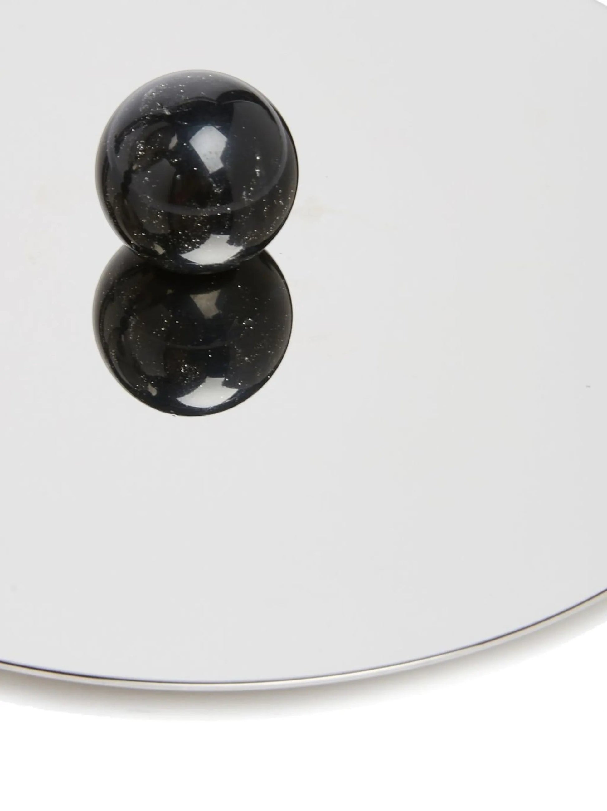 Eclectic Sambonet Penelope ice bucket lid featuring a polished stainless steel surface and black marble-effect knob.