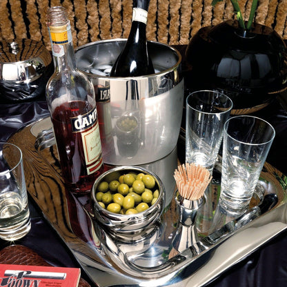 Eclectic Sambonet Sphera 12 cm stainless steel serving bowl filled with green olives on a reflective silver tray