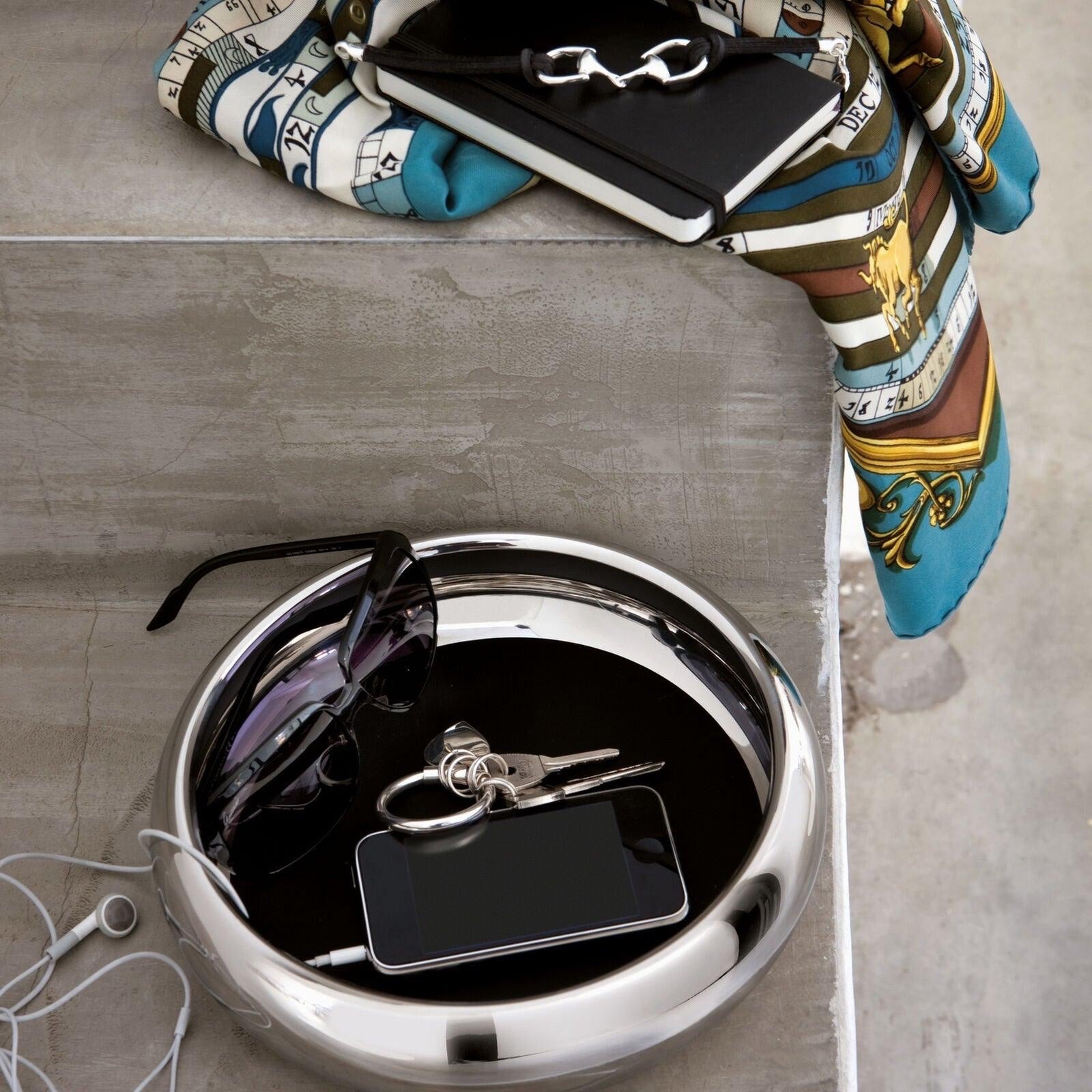Eclectic Sambonet Sphera stainless steel serving bowl used as a decorative tray for keys and accessories