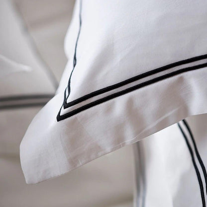 Eclectic Saxon white cotton sateen duvet cover with elegant black satin stitch double border detail.