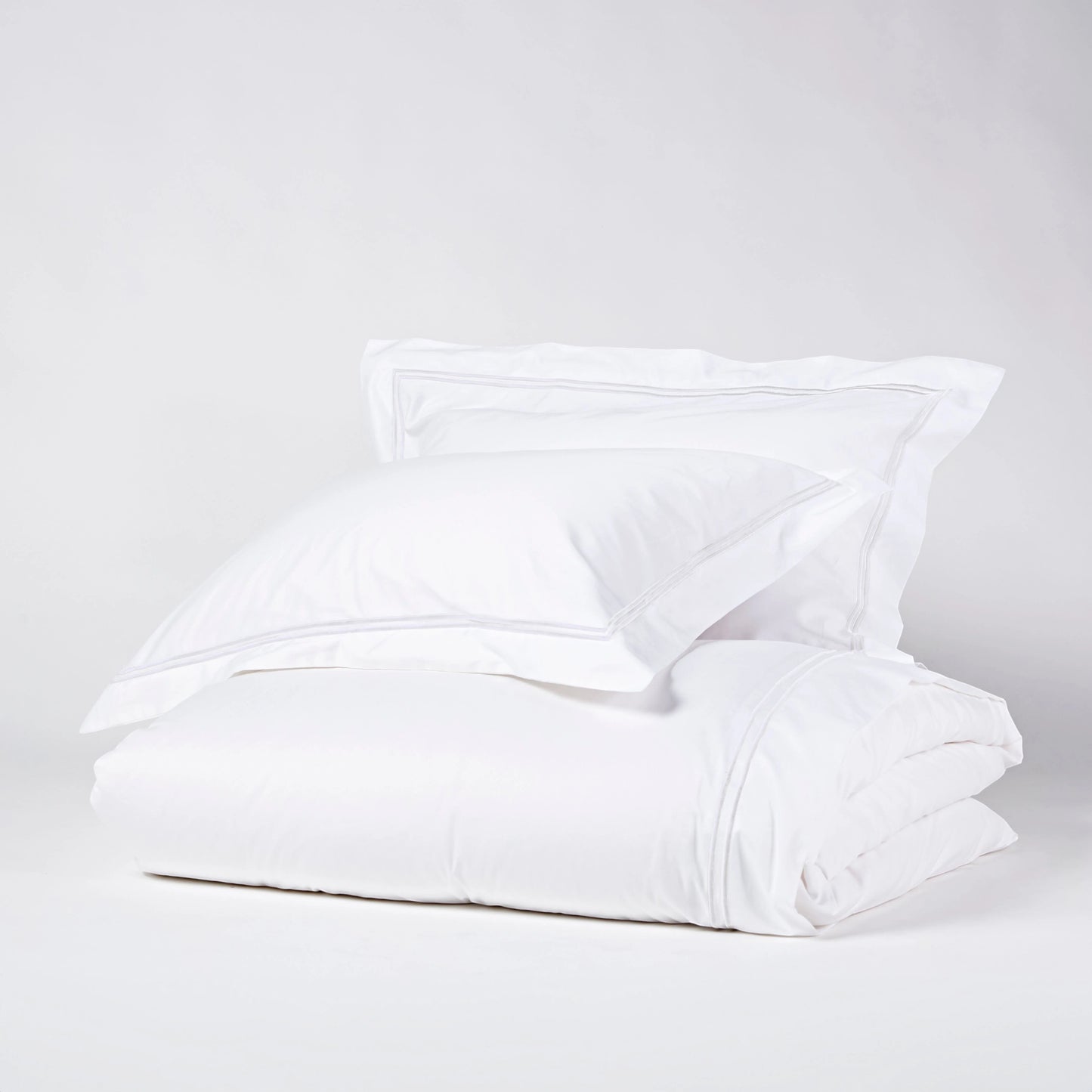 Eclectic Saxon white cotton sateen duvet cover set with elegant tonal satin-stitched double border detail.