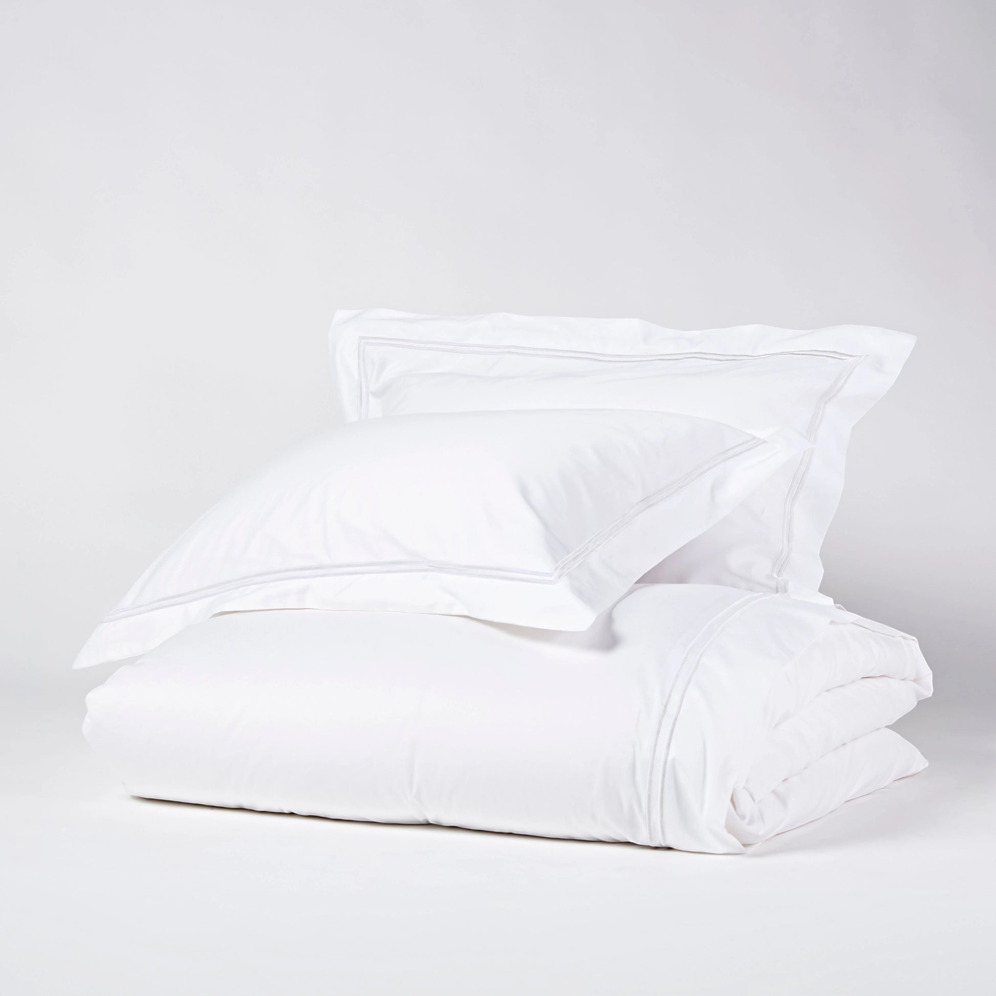 Eclectic Saxon white cotton sateen duvet cover set with elegant tonal satin-stitched double border detail.