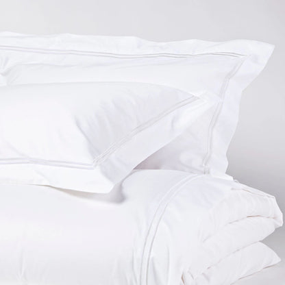 Eclectic Saxon white cotton sateen duvet set with elegant tonal satin-stitched double border detail.