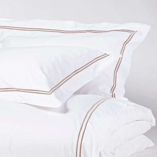 Eclectic Saxon white cotton sateen duvet cover set with elegant stone-coloured double satin stitch detail.