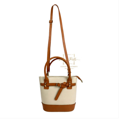 Eclectic Sorrento cream and tan grain leather crossbody bag with gold hardware and adjustable strap