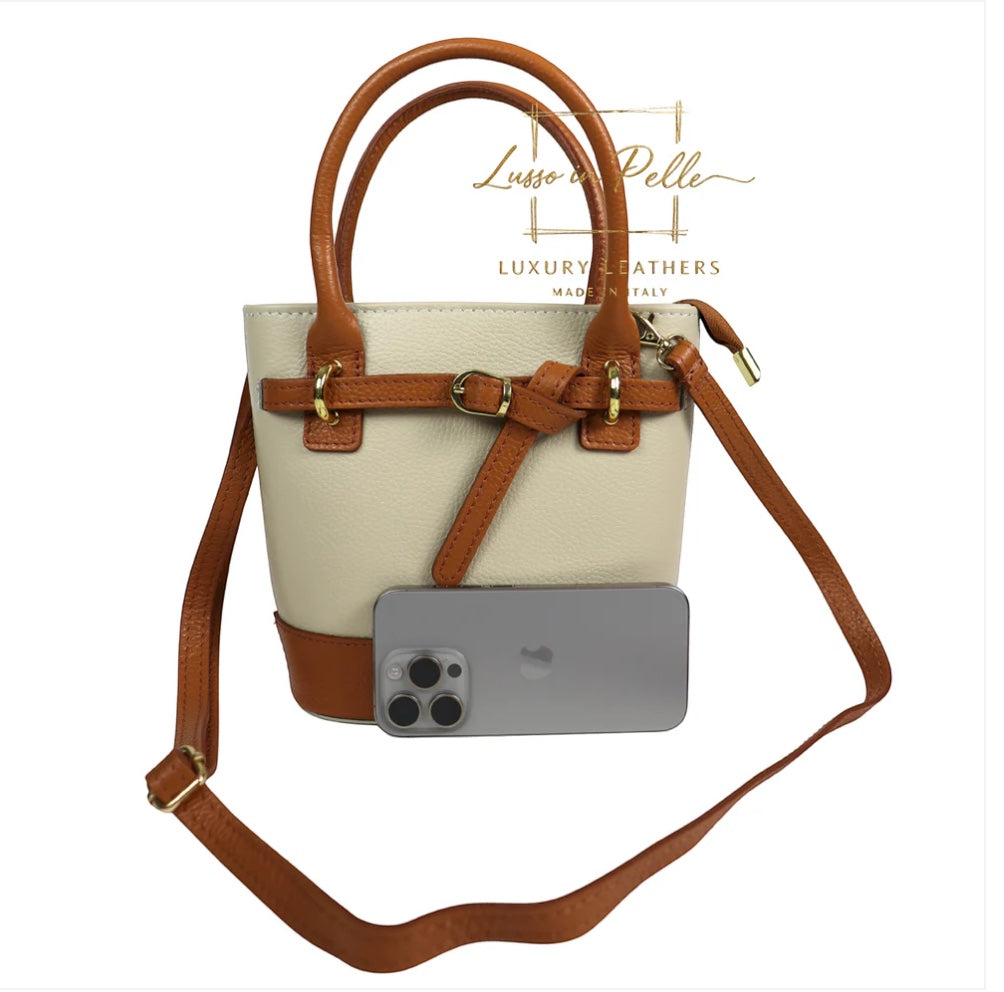 Eclectic Sorrento cream and tan grain leather crossbody bag with gold hardware and adjustable strap