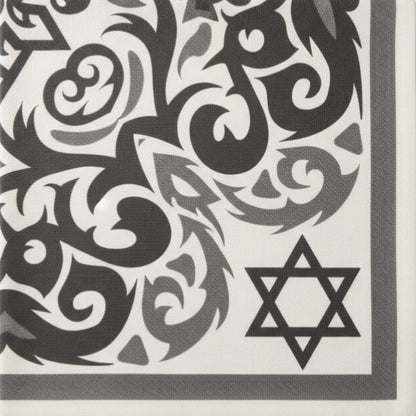 Eclectic black and white disposable napkin with intricate ornamental patterns and a Star of David detail.
