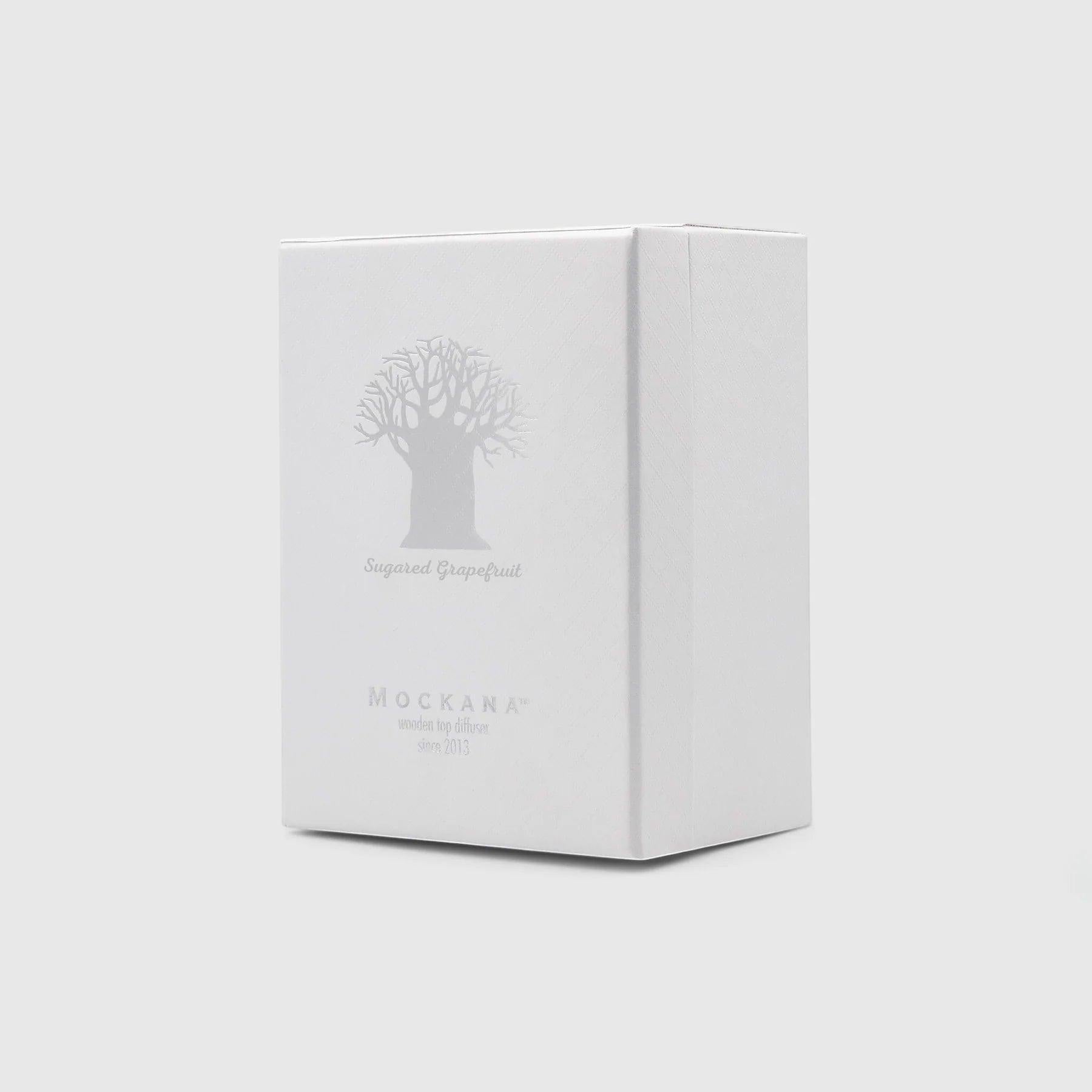 Eclectic Sugared Grapefruit wooden top diffuser in a premium white silk-lined presentation box