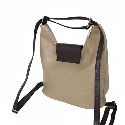 Eclectic Donatello Duo taupe grain leather convertible bag with black contrast straps and silver-tone hardware.