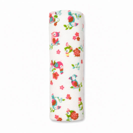Eclectic Toucan Paradise cotton flannel baby swaddle featuring colourful toucans and flowers on a white background.