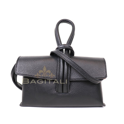 Eclectic Venezia black pebbled leather wristlet bag with a detachable wrist loop and minimalist flap design.