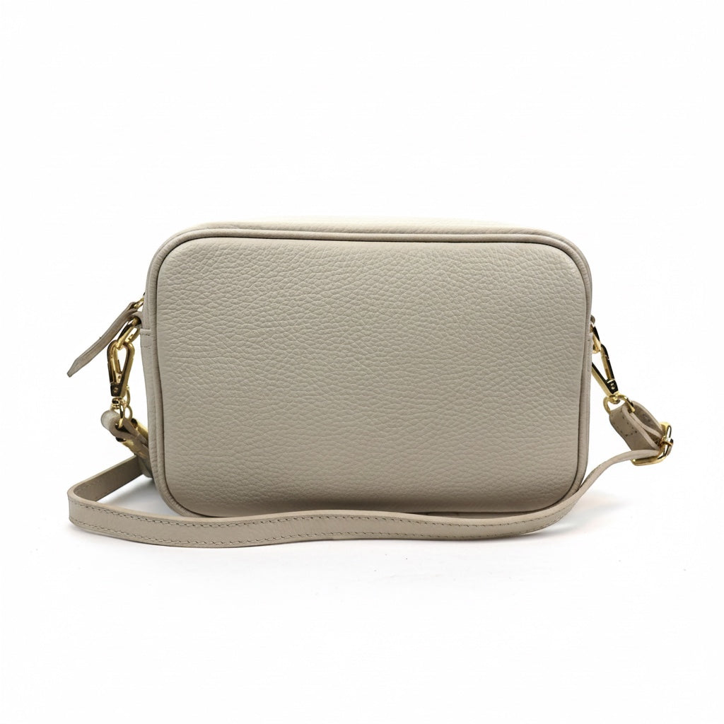 Eclectic Venezia cream Italian leather crossover bag with gold hardware and tassel detail