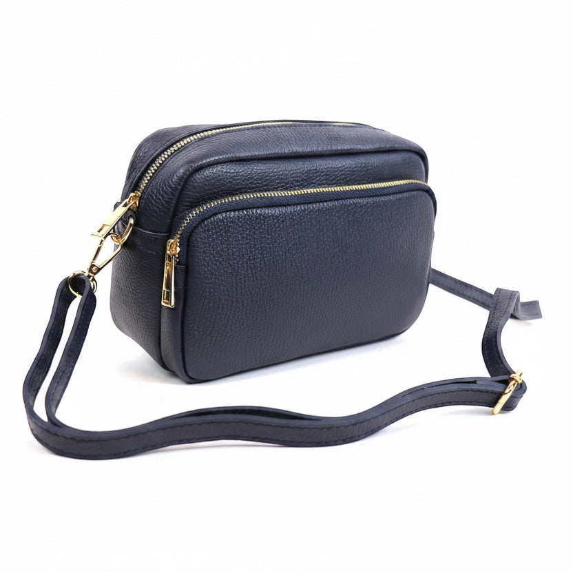 Eclectic Venezia navy blue Italian leather crossover bag with gold metallic zippers and a front pocket