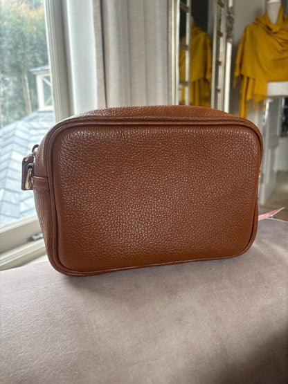 Eclectic Venezia tan leather crossover bag with textured finish, viewed from the back.