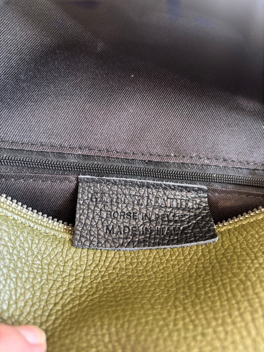 Eclectic Verona olive green pebbled leather backpack interior with Made in Italy leather label and canvas lining